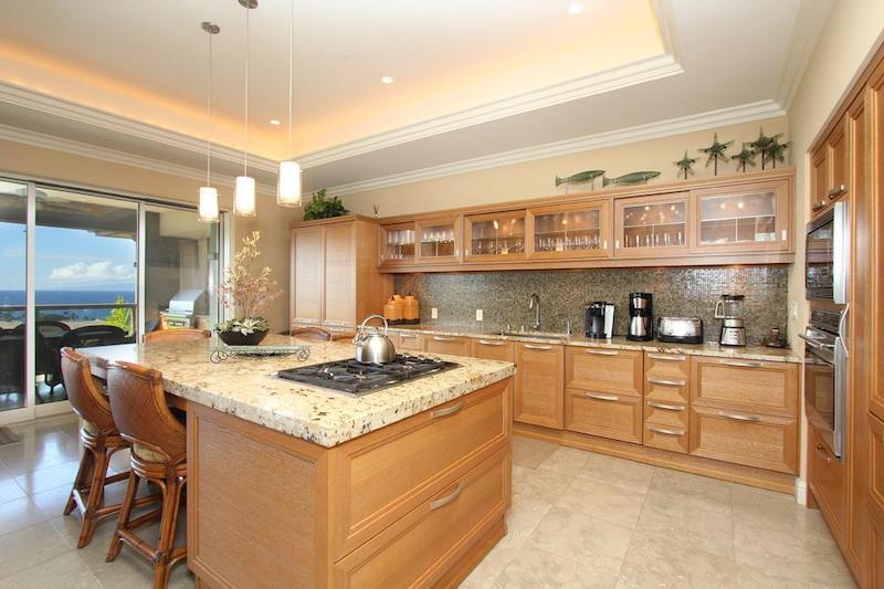 Beautiful kitchen showing the Oak cabinets in a Maile floor plan