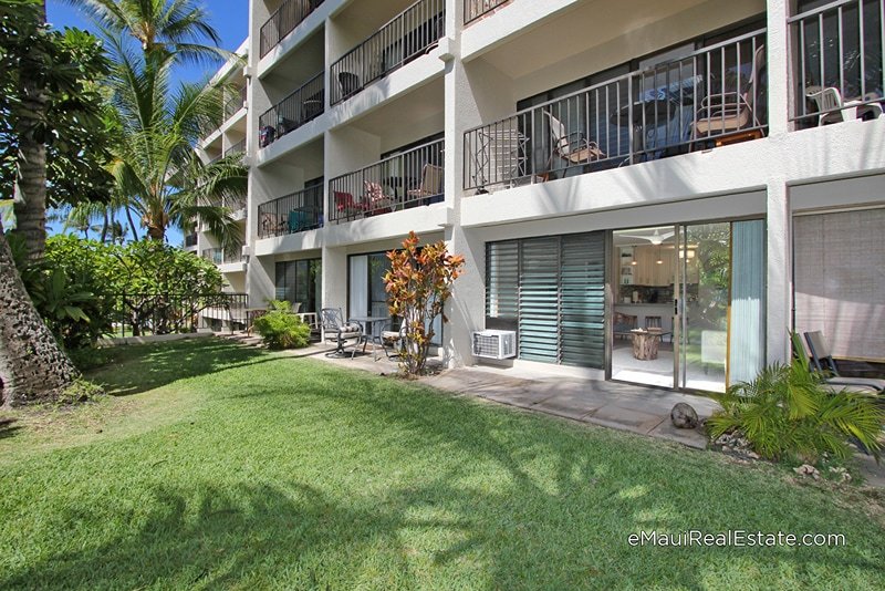 Ground floor units at Kihei Akahi C Building open out to the green common areas