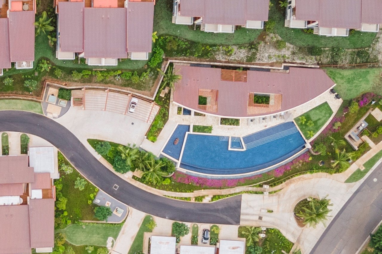 Overhead photo of the community pool and recreation area at Makalii that was taken in December 2021